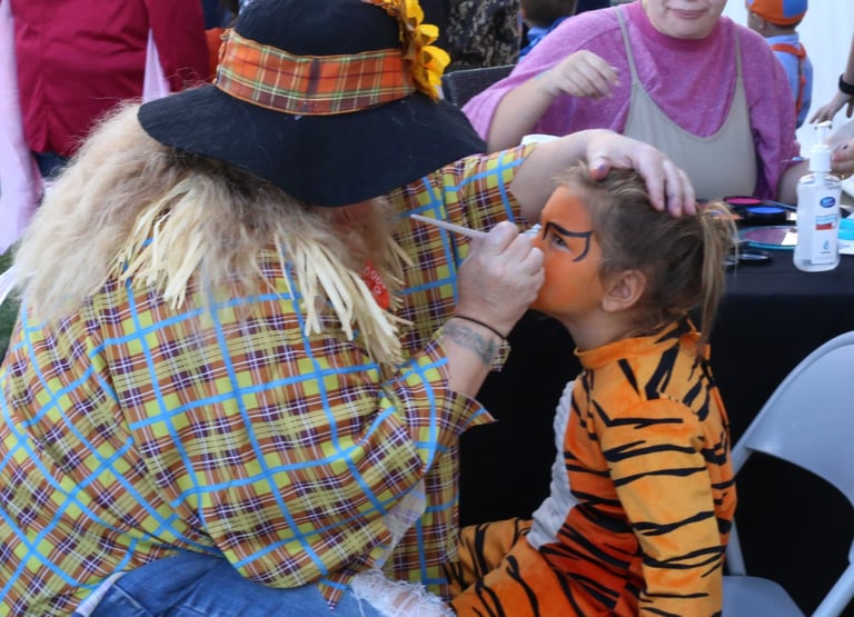 Face painting fun at a halloween event