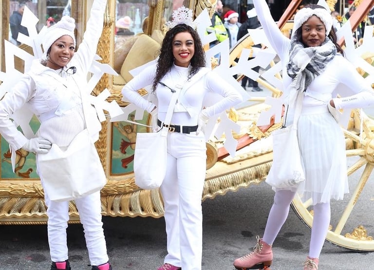 Snowflake skaters posing during a parade