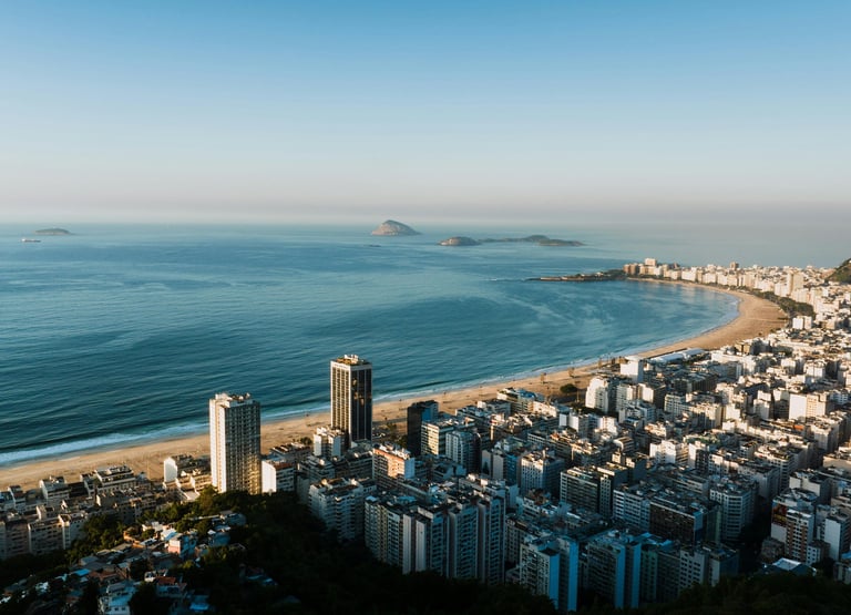 a view of a city with a beach and a view of the ocean, Copacabana, Rio de Janeiro, Brazil