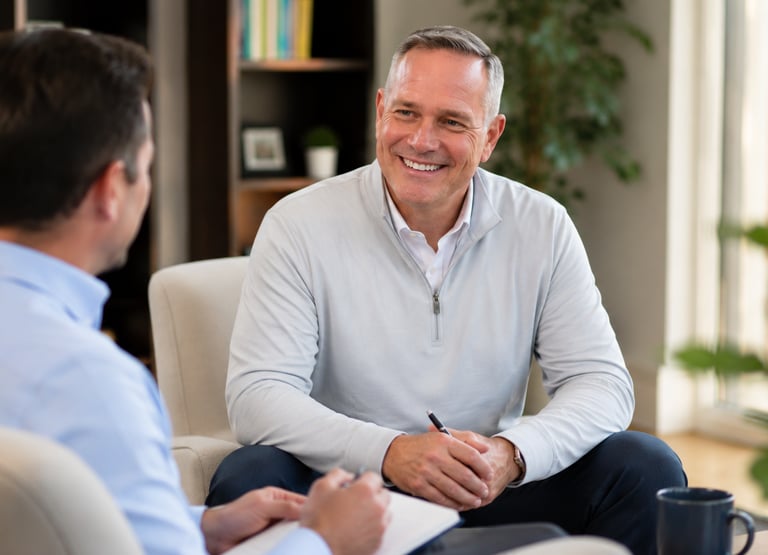 Doug in a meeting discussing customer experience.