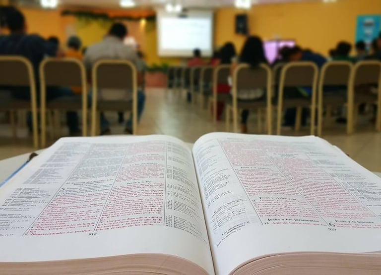 a bible opened to show a book with a book open
