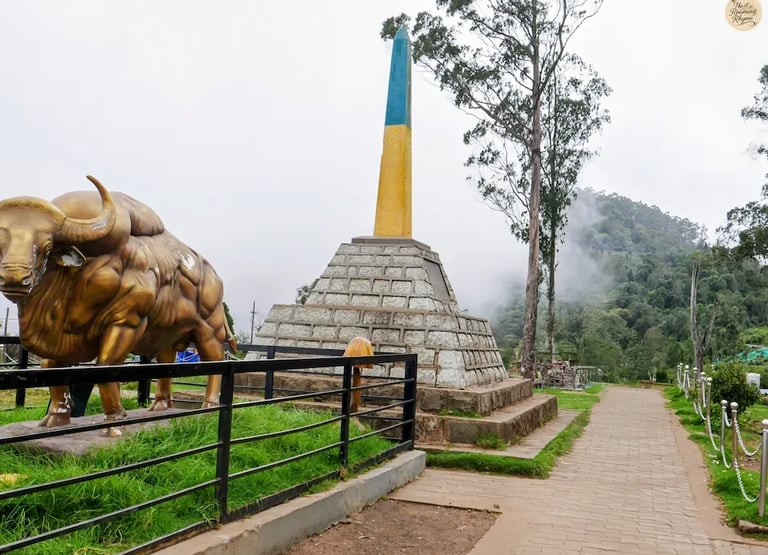 Pillar at Moir Point with misty hills in the background.