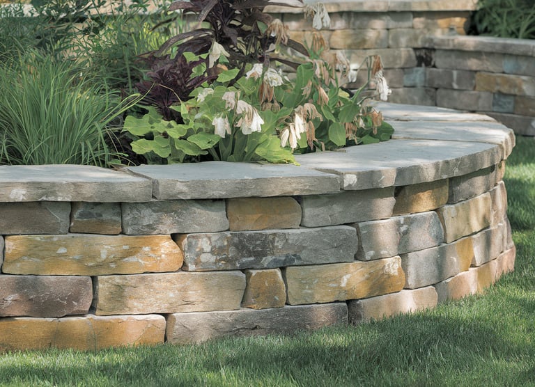 a stone wall with a stone wall and a stone wall
