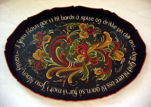 A navy blue rosemaled platter