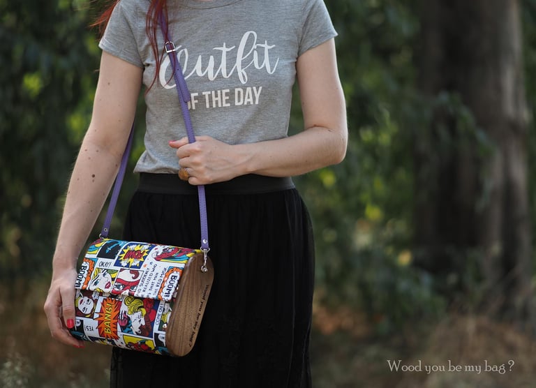 a woman with wooden bag made from walnut wood and retro fabric