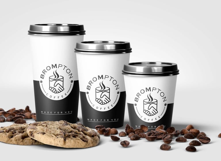 three coffee cups with coffee beans and coffee beans