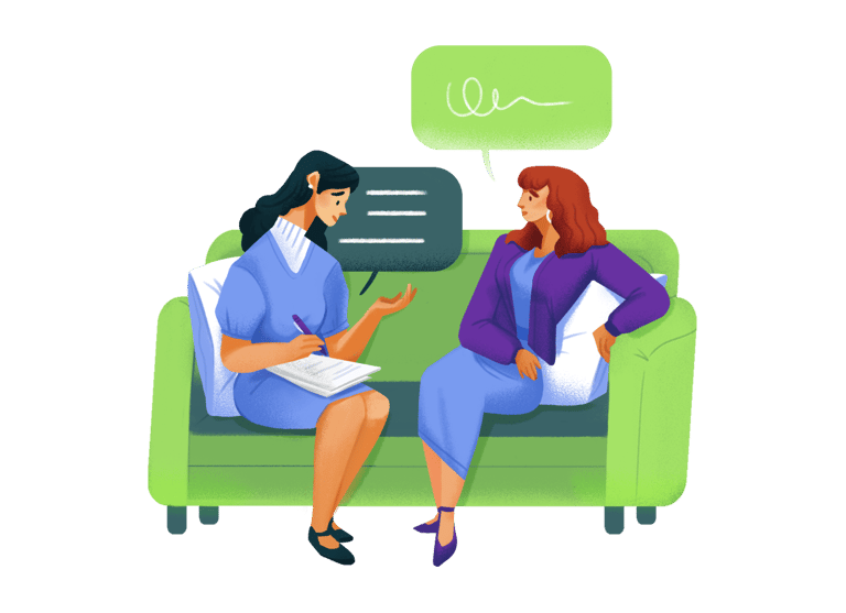 a woman sitting on a couch with a laptop