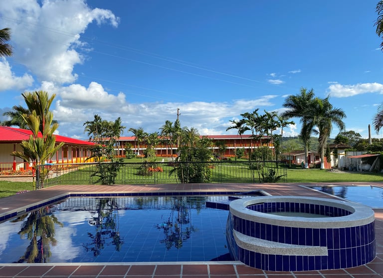 a pool with a pool and a fenced in area