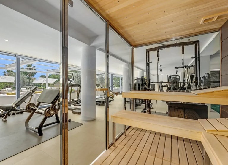Spa area with loungers and wood ceiling at Villa Serenity