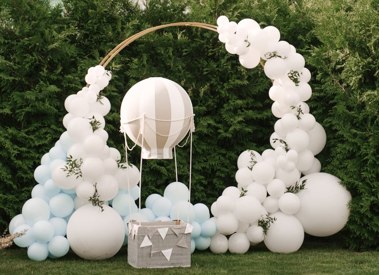 a balloon - shaped balloon with a white balloon