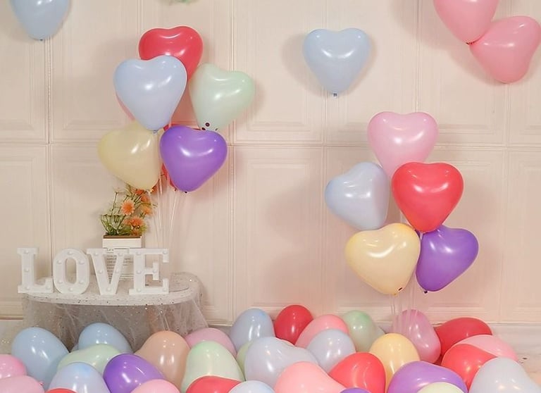a bunch of balloons and balloons are in a room