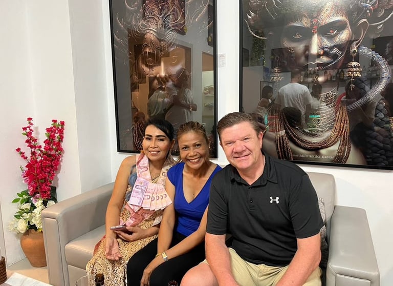 a man and woman sitting on a couch in a living room