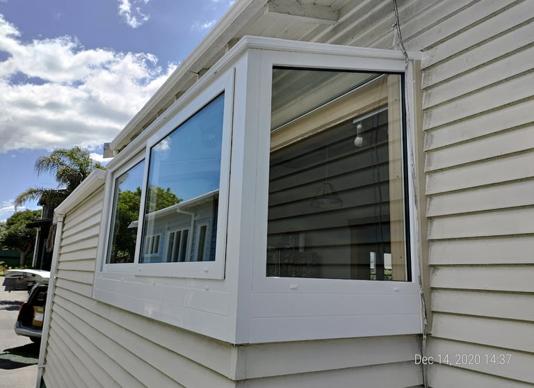 UPVC bay window installation adding space and light to Auckland home, New Zealand