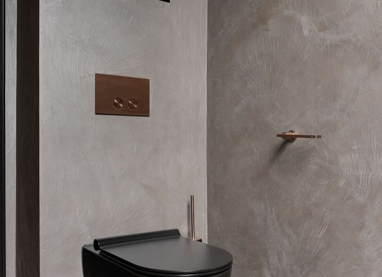 A modern and luxurious bathroom featuring multi-coloured microcement