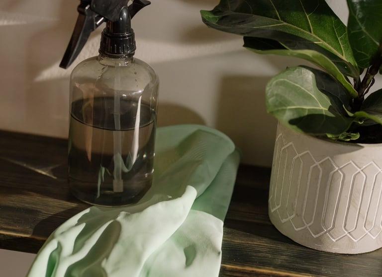 Set of gloves and a spray bottle resting on a bench. Cleaner Job positions avaiable