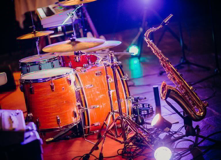 a saxophone player playing a saxophone and saxophone