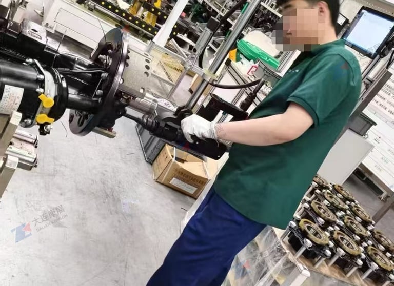 Dalian Kangzhan right-angle torque pistol nutrunner operating on e-drive axle assembly line
