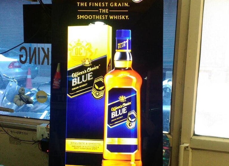 whiskey bottle highlighted with blockout printing