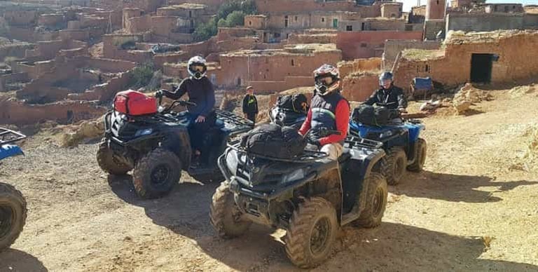 riding through a Berber village near Agadir