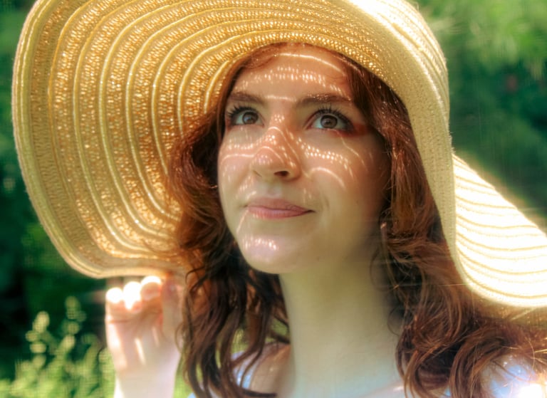 Creative portrait of a senior student in northern virginia park at golden hour