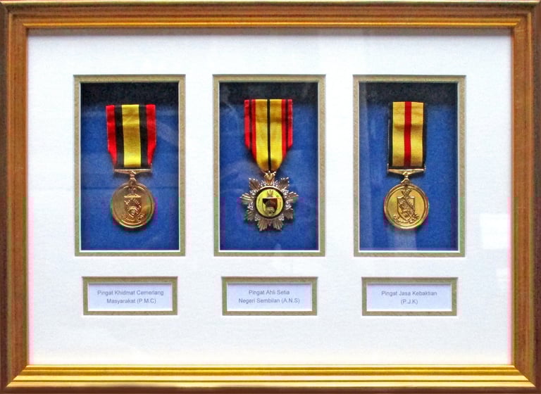 Medals preserved in a custom made shadow box frame