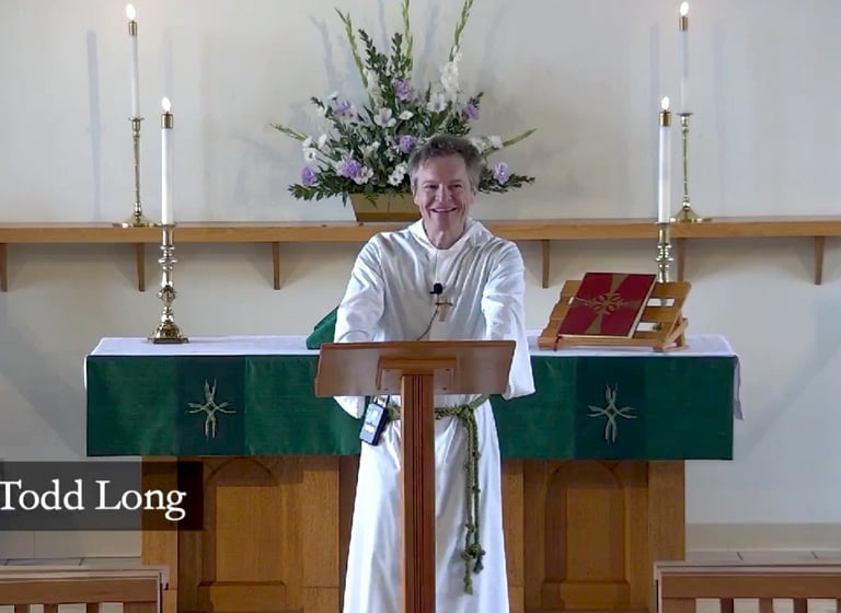 Image of Dr. Todd Long delivering homily