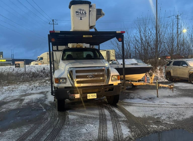 a large white truck parked in snowy northern ontario