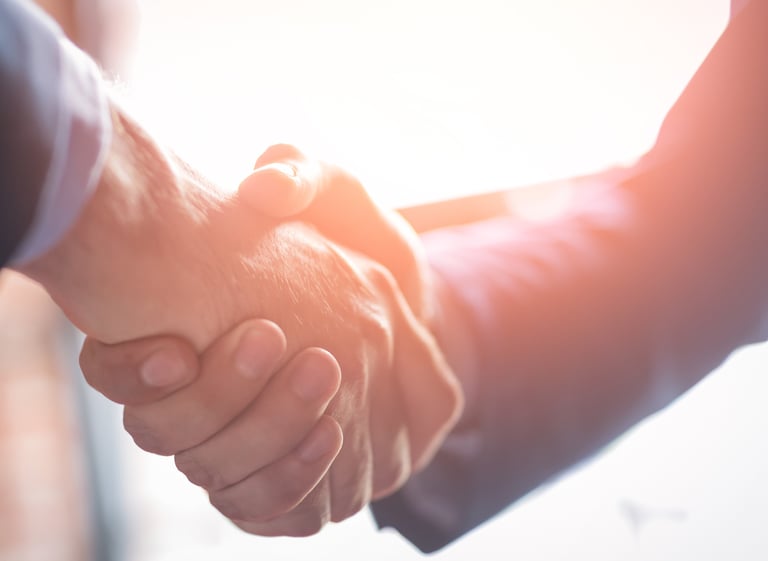 Partnership handshake representing Vital Talents collaboration with Saudi Hospitals.