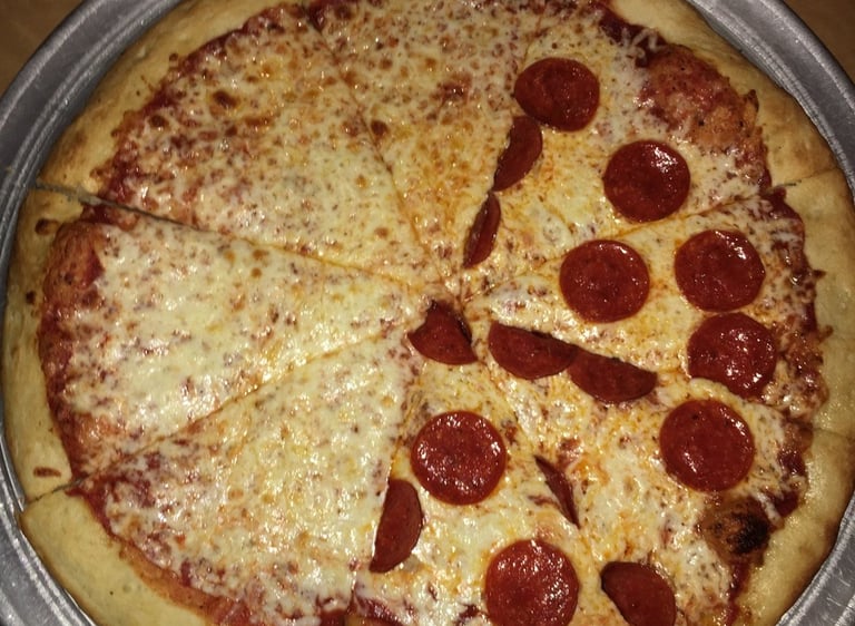 half cheese half pepperoni pizza