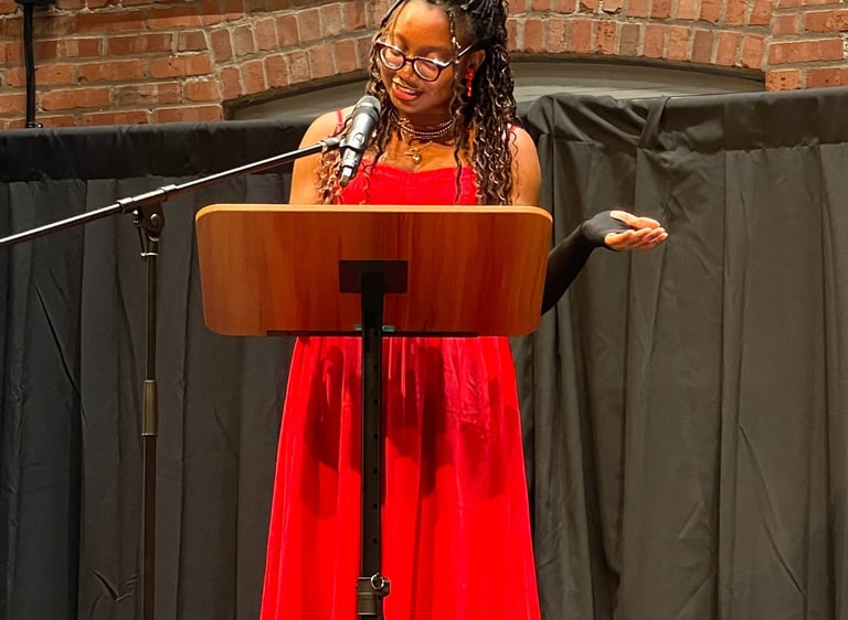 Iheoma Uzomba reads poetry at the 2025 Writers Guild of Alberta Mentorship program