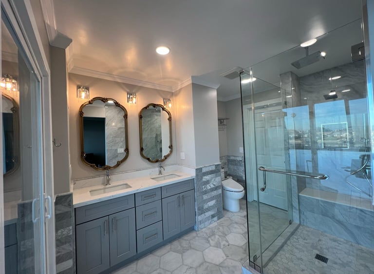 Bathroom renovation with modern finishes by Asha Construction