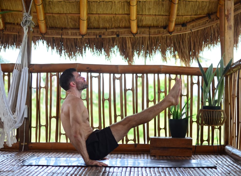 V-Sit on Yoga Mat in Nipa Hut