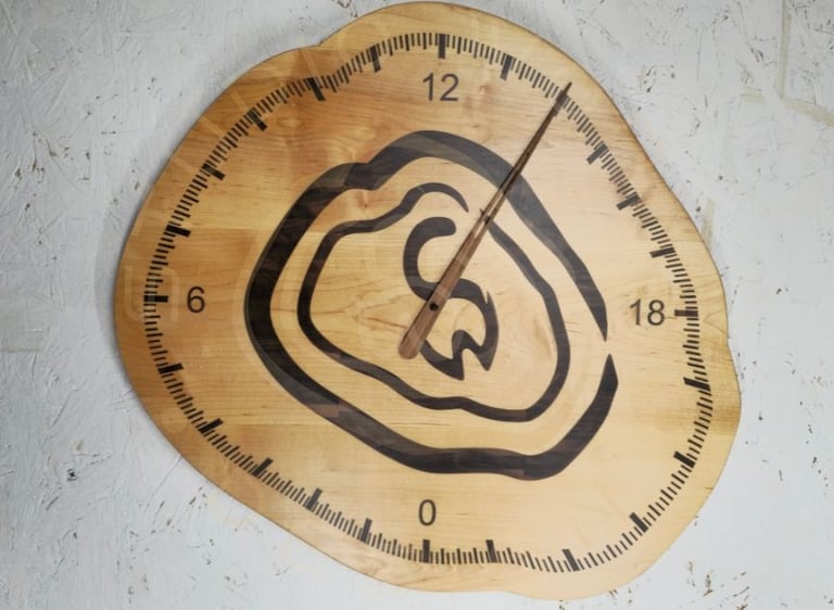 24-hour wood inlay clock in shape of logo