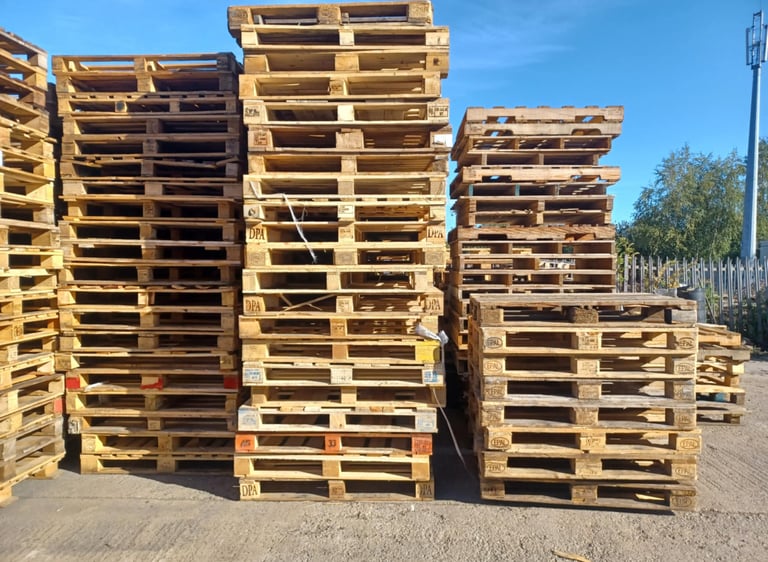 Pallets stacked up needing repair