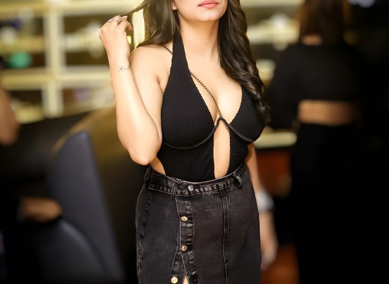 a woman in a black dress and a black dress