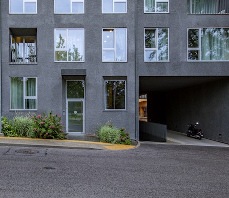 a building with a motorcycle parked in front of it