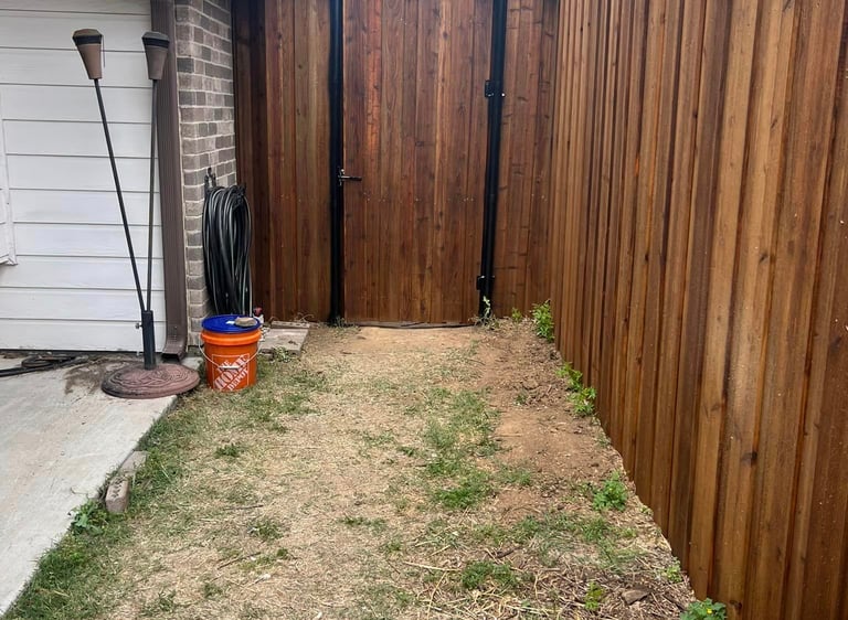 Dark Wood Fence Near House