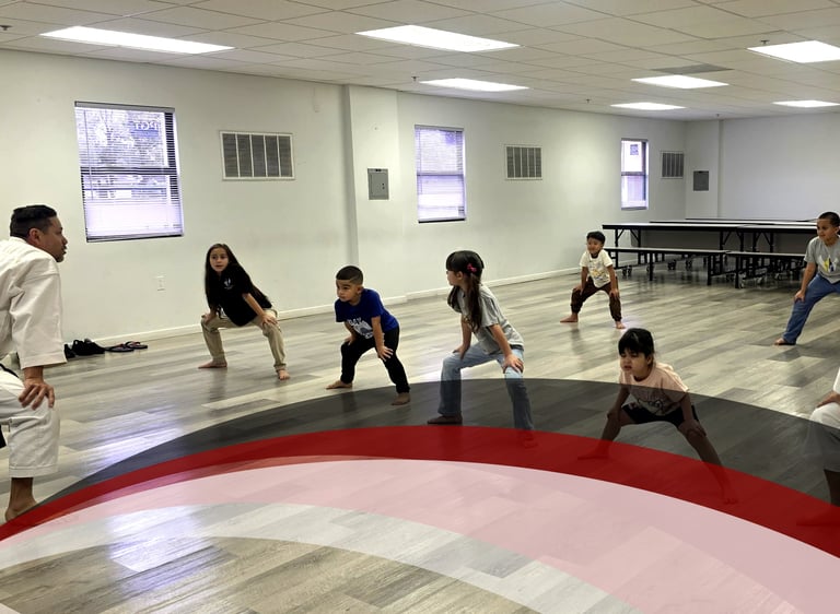 Karate training session in Project OBI Karate (POK) Orlando program..