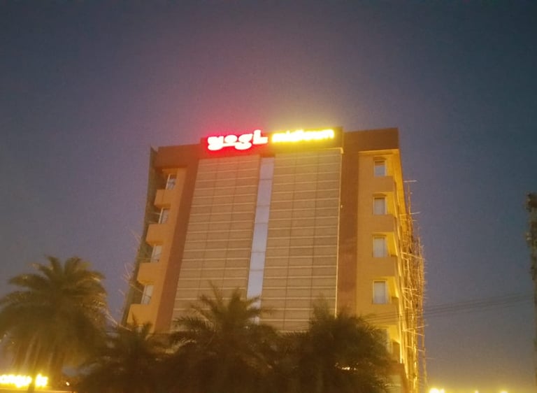 Glow Sign Board on Rooftop