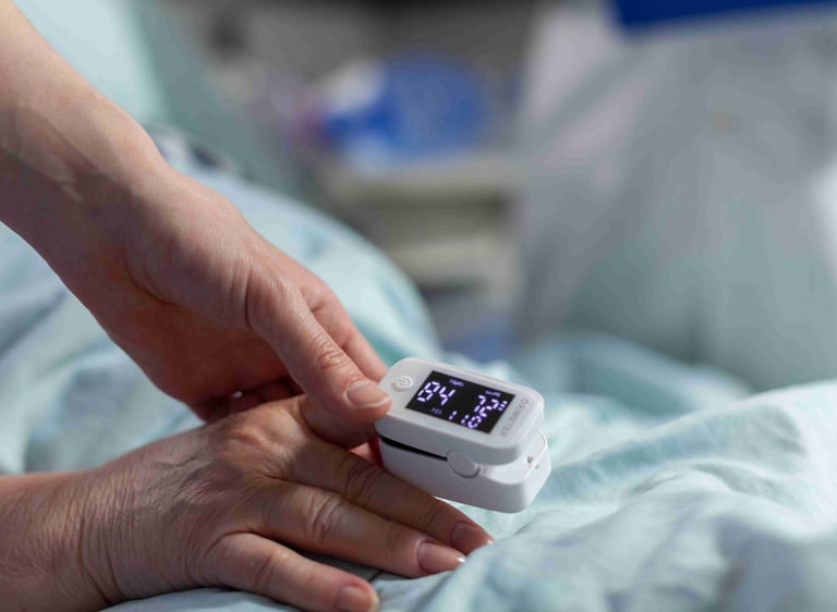 a caregiver checking and monitoring the health of an elderly person