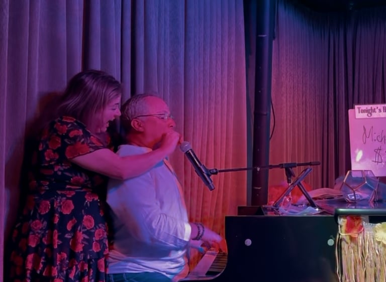 Karey Nickel includes an audience member at a dueling pianos show