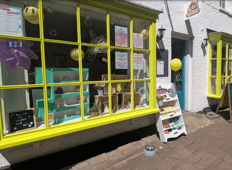 The Crafty Beanie toddler craft class studio in Saffron Walden with colourful shopfront and window displays.