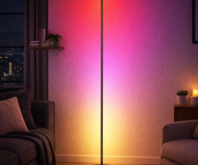 Slim LED floor lamp casting colorful ambient light across a modern living room