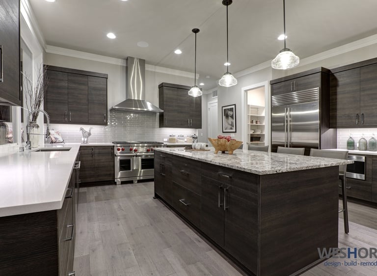 Glenview IL kitchen featuring dark wood cabinets and stainless steel appliances.