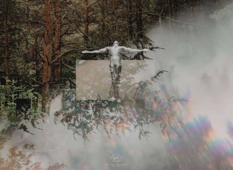 stage design of of a man standing with open arms in a misty forest landscape.
