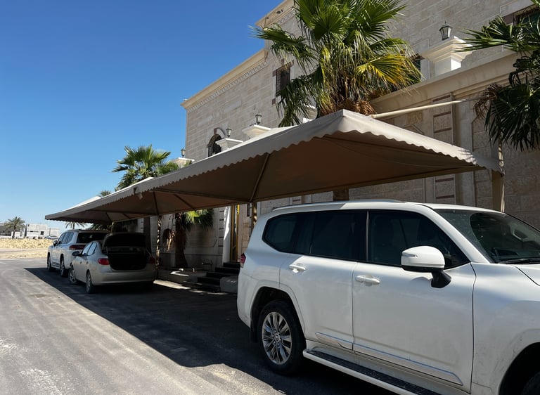 Custom-installed parking shade solutions by Al Naim Fabrication.