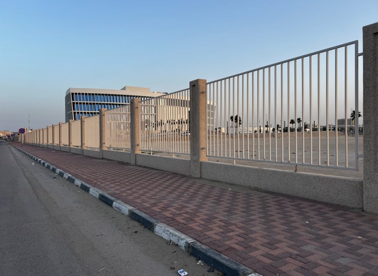 Professional steel wall fencing projects by Al Naim Fabrication.
