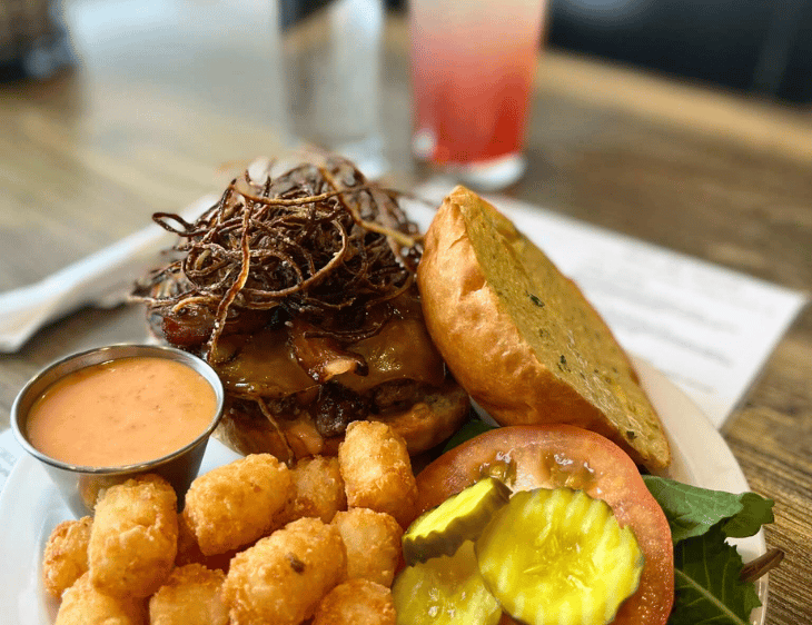 burger bacon fried onions cheddar pickles aioli philly bun