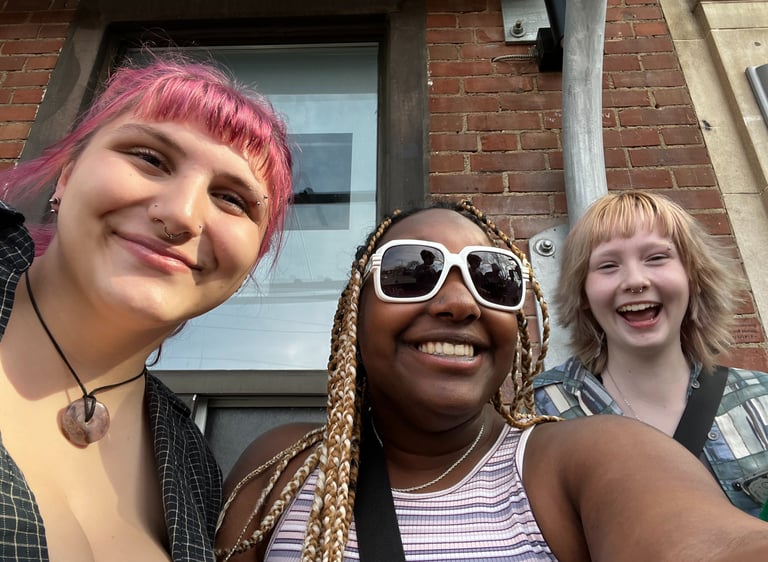 3 people taking a selfie 