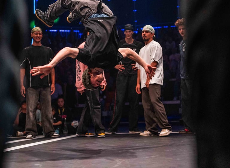 a man doing a trick in breaking battle